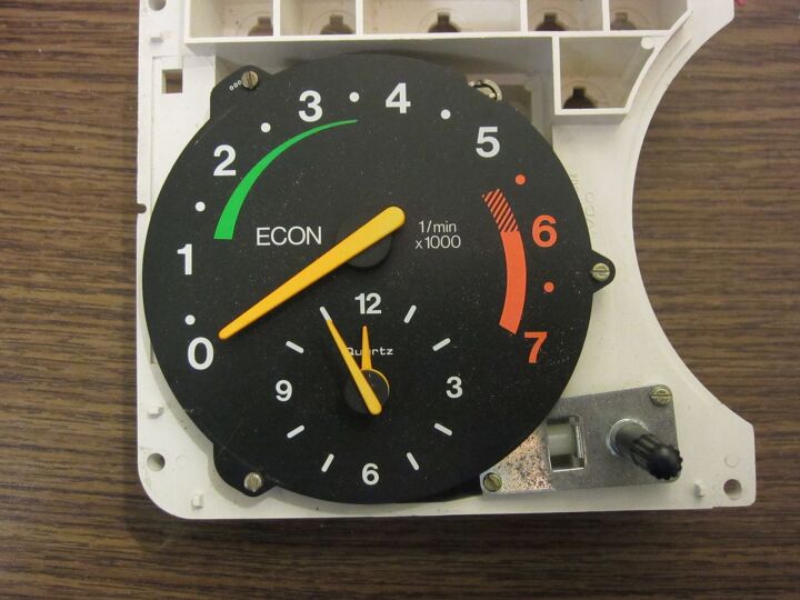name that car clock brightly colored clock tach combo