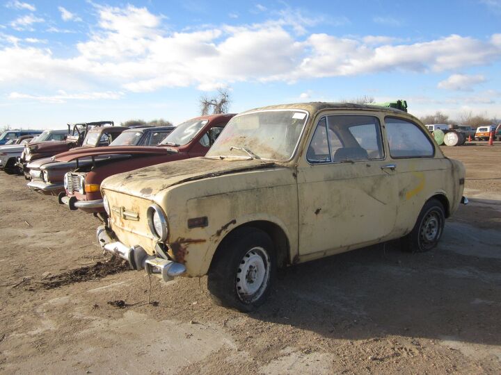 studebaker champion or peugeot 404 vast colorado junkyard s inventory auctioned off