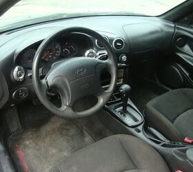 Details 142+ hyundai coupe interior latest