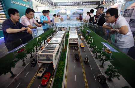 beijing straddles traffic jams with straddle bus
