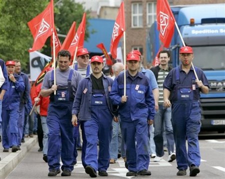 german autoworkers threaten strike