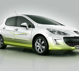 Peugeot/Citroen Drop Hybrid Diesel Co-Op for In-House Effort