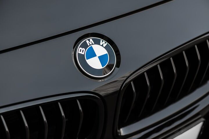 bmw says less expensive cars will remain in production