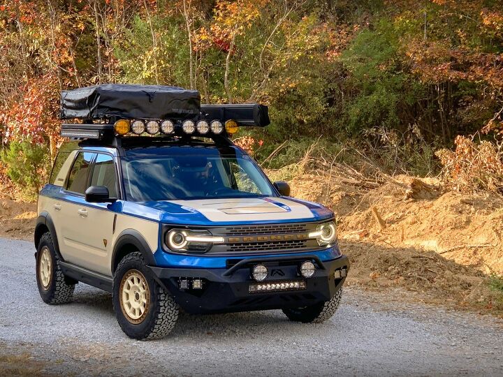 report ford patents powered roof rack system