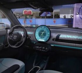 mini reveals updated retro futuristic interior for the new cooper