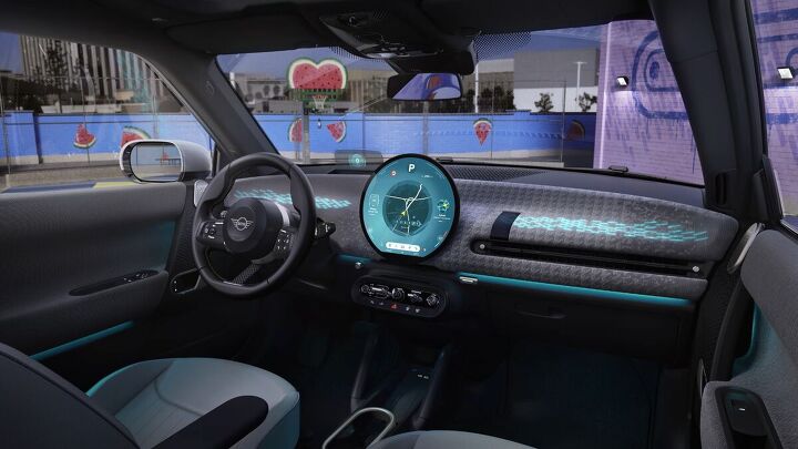 mini reveals updated retro futuristic interior for the new cooper