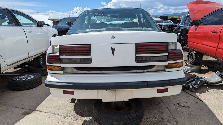 junkyard find 1988 pontiac sunbird se coupe