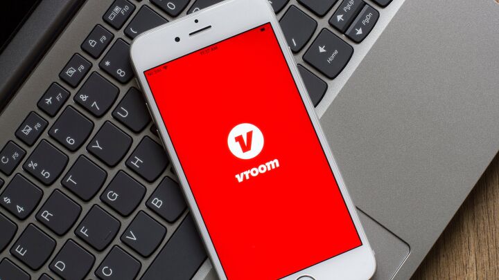 online used car retailer vroom to shutter operations