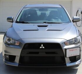 used car of the day 2013 mitsubishi lancer evo x