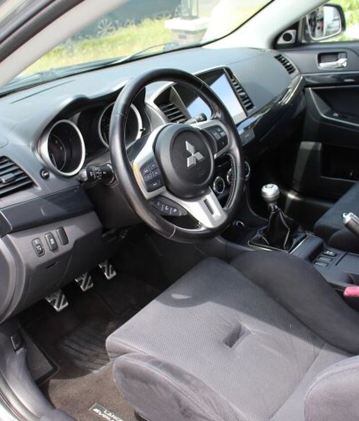 used car of the day 2013 mitsubishi lancer evo x