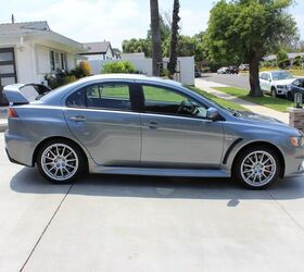 used car of the day 2013 mitsubishi lancer evo x