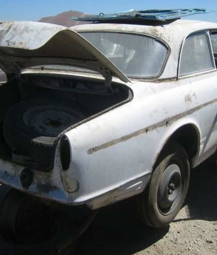 junkyard find pair of volvo amazons