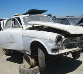 junkyard find pair of volvo amazons