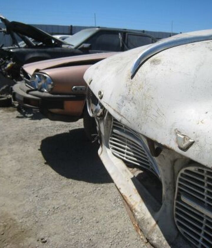 junkyard find pair of volvo amazons
