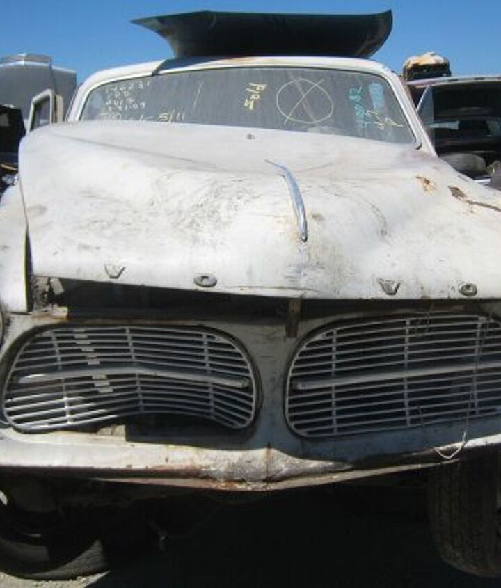 junkyard find pair of volvo amazons