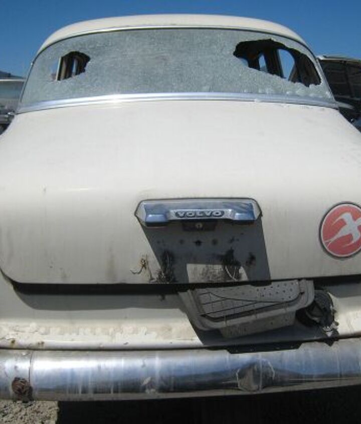 junkyard find pair of volvo amazons