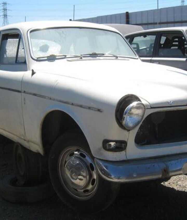 junkyard find pair of volvo amazons