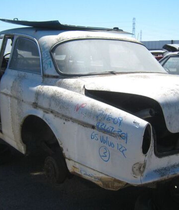 junkyard find pair of volvo amazons