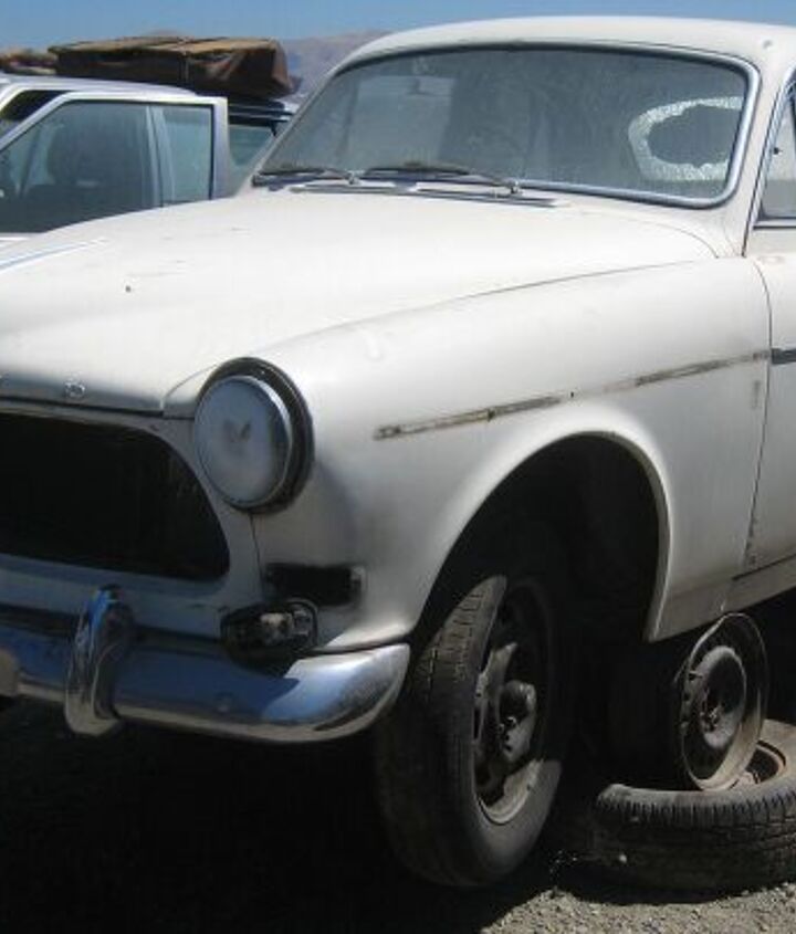 junkyard find pair of volvo amazons