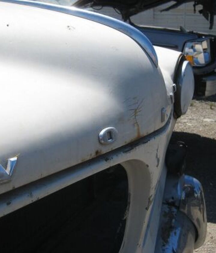 junkyard find pair of volvo amazons