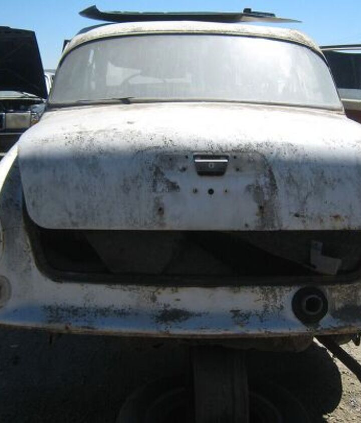 junkyard find pair of volvo amazons