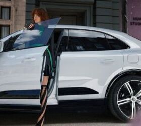 see 53 photos of the porsche macan ev