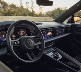 see 53 photos of the porsche macan ev