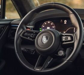 see 53 photos of the porsche macan ev