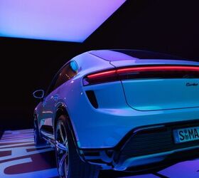 see 53 photos of the porsche macan ev