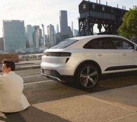 see 53 photos of the porsche macan ev