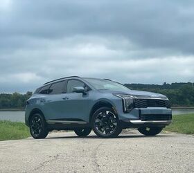 see more photos of the 2026 kia sportage hybrid