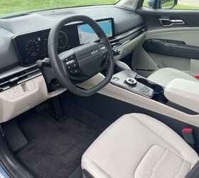 see more photos of the 2026 kia sportage hybrid