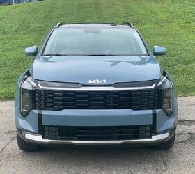 see more photos of the 2026 kia sportage hybrid