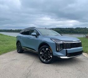 see more photos of the 2026 kia sportage hybrid