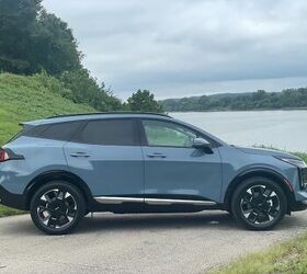 see more photos of the 2026 kia sportage hybrid