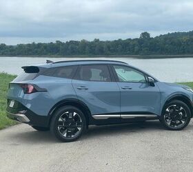 see more photos of the 2026 kia sportage hybrid