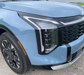 see more photos of the 2026 kia sportage hybrid