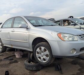 junkyard find 2004 kia spectra with 448 559 miles
