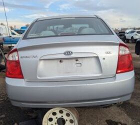 junkyard find 2004 kia spectra with 448 559 miles