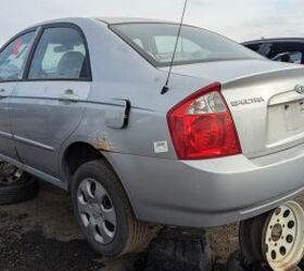 junkyard find 2004 kia spectra with 448 559 miles