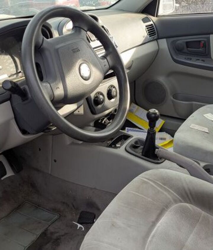 junkyard find 2004 kia spectra with 448 559 miles