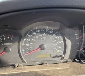 junkyard find 2004 kia spectra with 448 559 miles