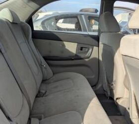 junkyard find 2004 kia spectra with 448 559 miles