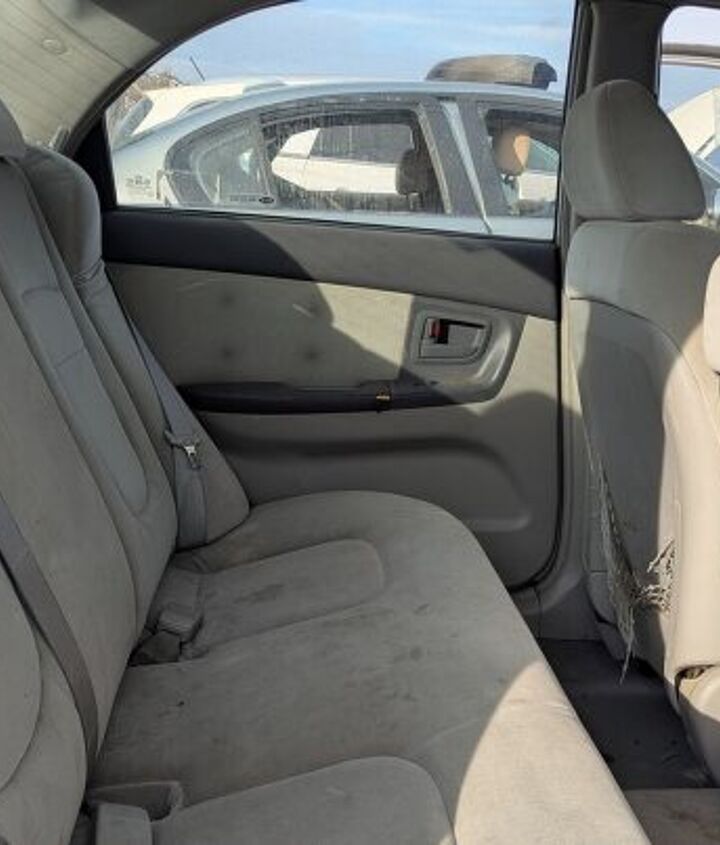 junkyard find 2004 kia spectra with 448 559 miles