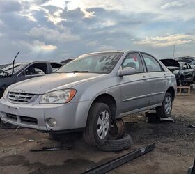 junkyard find 2004 kia spectra with 448 559 miles