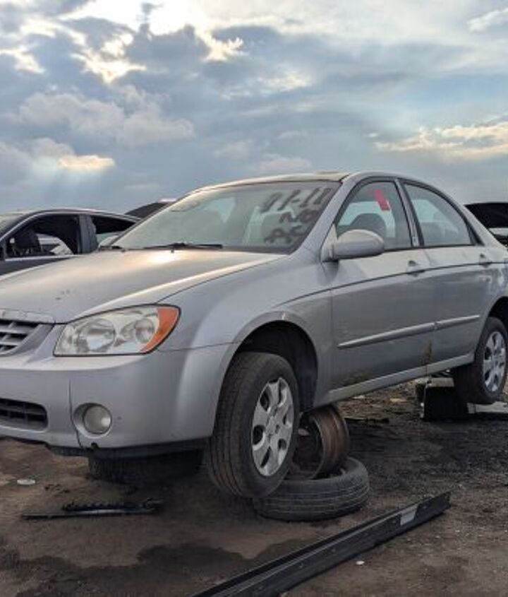 junkyard find 2004 kia spectra with 448 559 miles