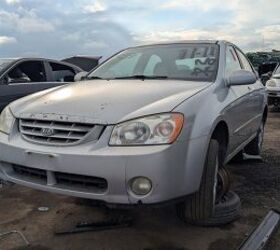 junkyard find 2004 kia spectra with 448 559 miles