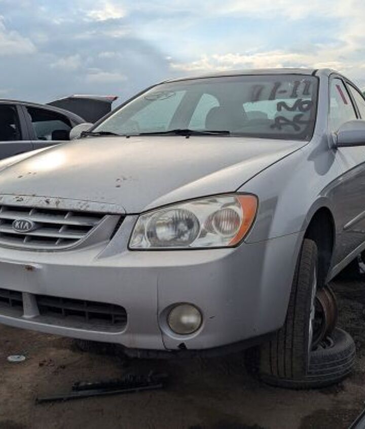 junkyard find 2004 kia spectra with 448 559 miles