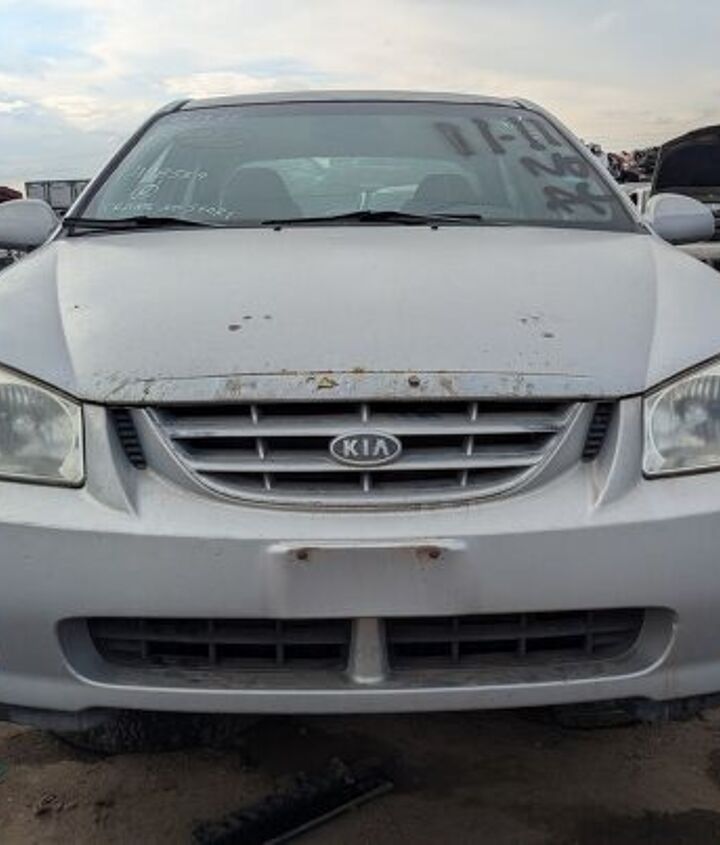 junkyard find 2004 kia spectra with 448 559 miles