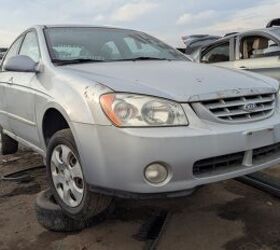junkyard find 2004 kia spectra with 448 559 miles